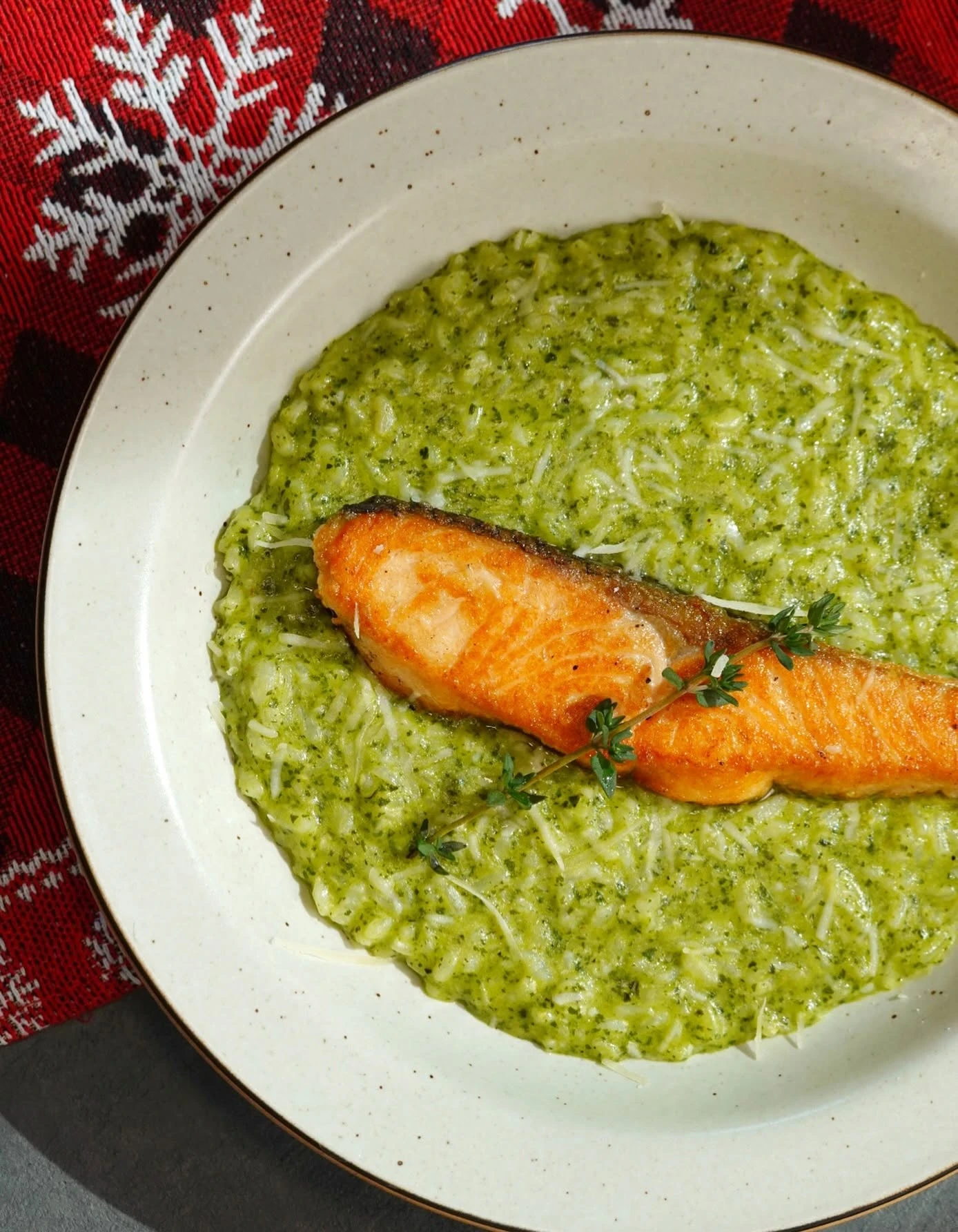 Pesto risotto with seared salmon at UPPER·T